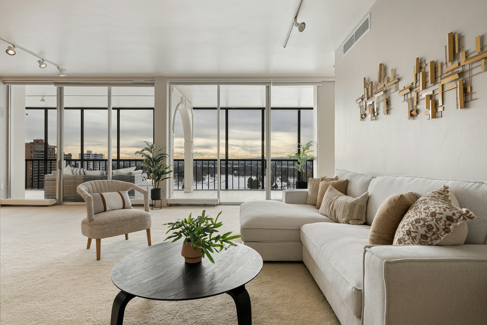 A bright, inviting living room with natural light and considered details